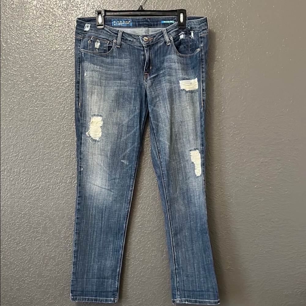 Distressed Blue Jeans